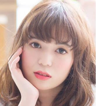 额头小发量少女生适合的蓬松短烫发图片