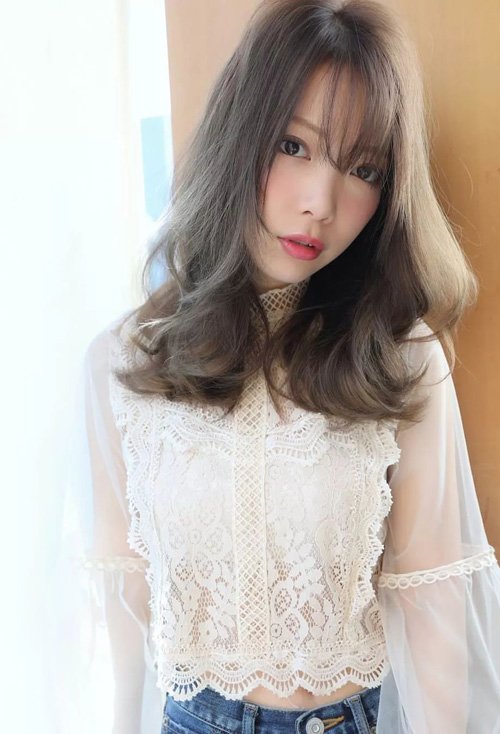 雅致内敛的女生梨花烫发型 长脸女生适合的中长烫发