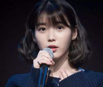女生短卷发发型  修脸减龄两不误