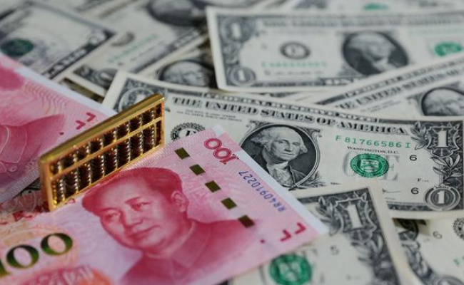 ​人民币对美元汇率今年首次破7.3关口 未来怎么走 