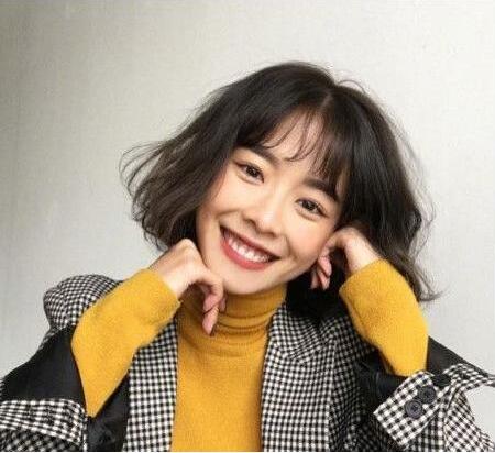 肥头大耳女生适合的微卷短发发型
